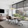 conference room with a table chairs and floor-to-ceiling windows