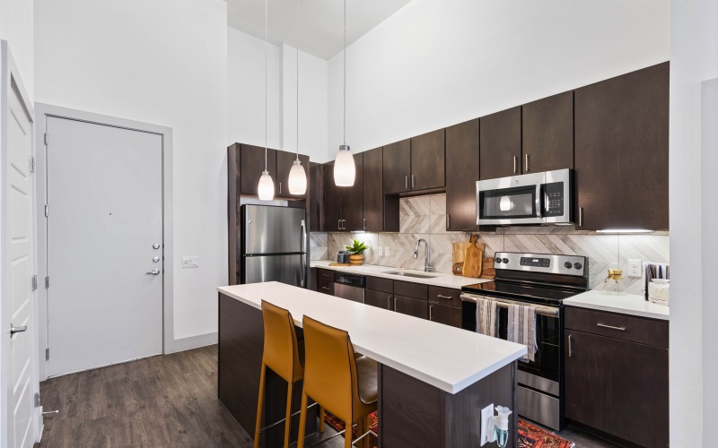 Open Kitchen with Stainless Steel Appliances