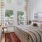 a bedroom with a large window