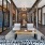 luxurious lobby with chandeliers, a table and chairs